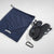 Xero Shoes x Literary Sport Genesis Navy Strap Black Sandal with a Top View Showing Both Sandals, a Matching Mesh Storage Bag, and a Black Carabiner