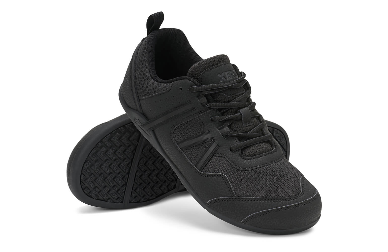 Xero Shoes Prio men's black barefoot athletic sneaker used as a premium minimalist comparison
