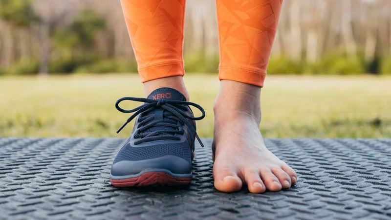 Bare foot making contact with natural terrain, showing the foot's sensory connection to the ground