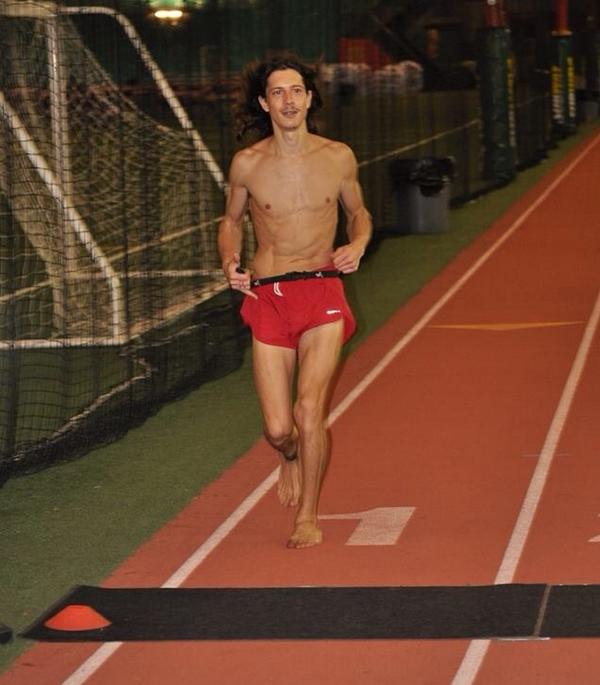 Andrew Snopes sets a barefoot running world record