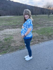 A pregnant woman wearing Dillon Canvas Slip-on shoes