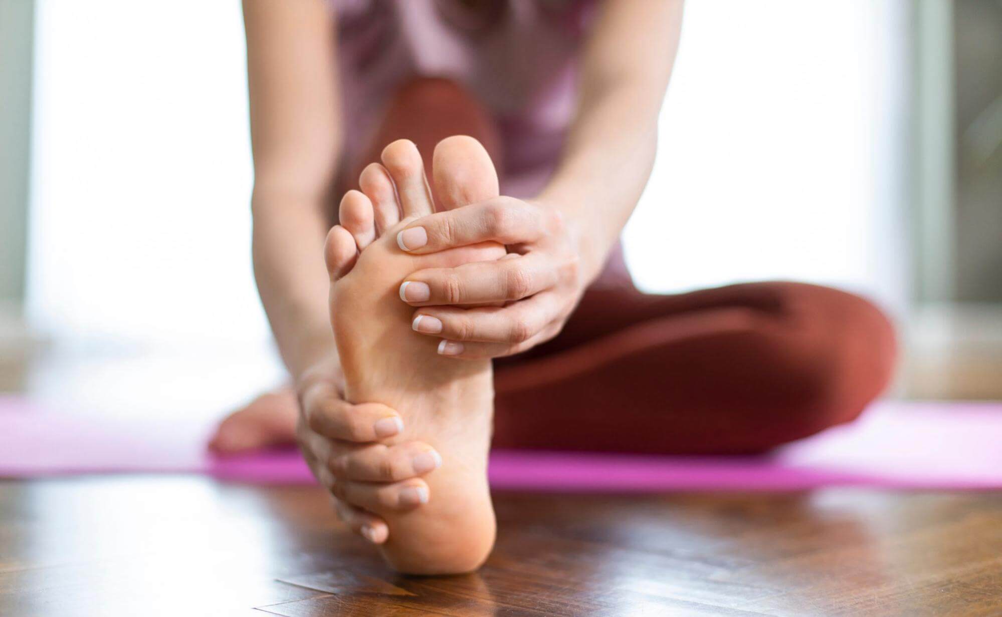 Woman stretching foot