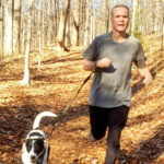 Sean Pricahrd running with his dog