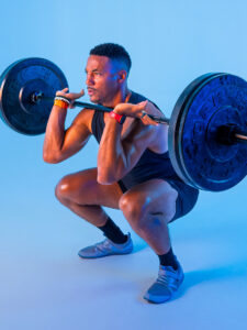 David Freeman showing the form for a barbell squat